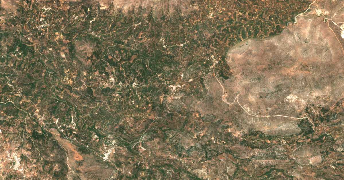 Mapa por satélite de Aḯmonas